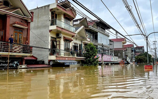 Flash flood sweeps away hamlet as Vietnam storm toll rises to 141 dead